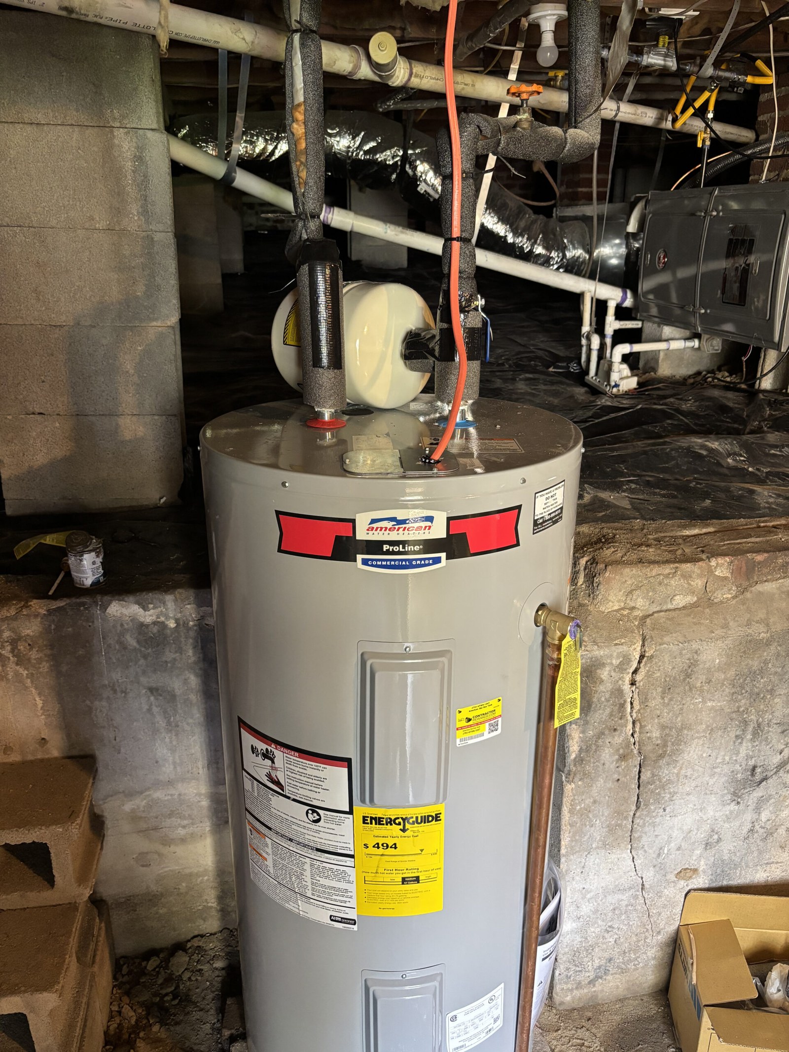 Water heater set in a basement utility space