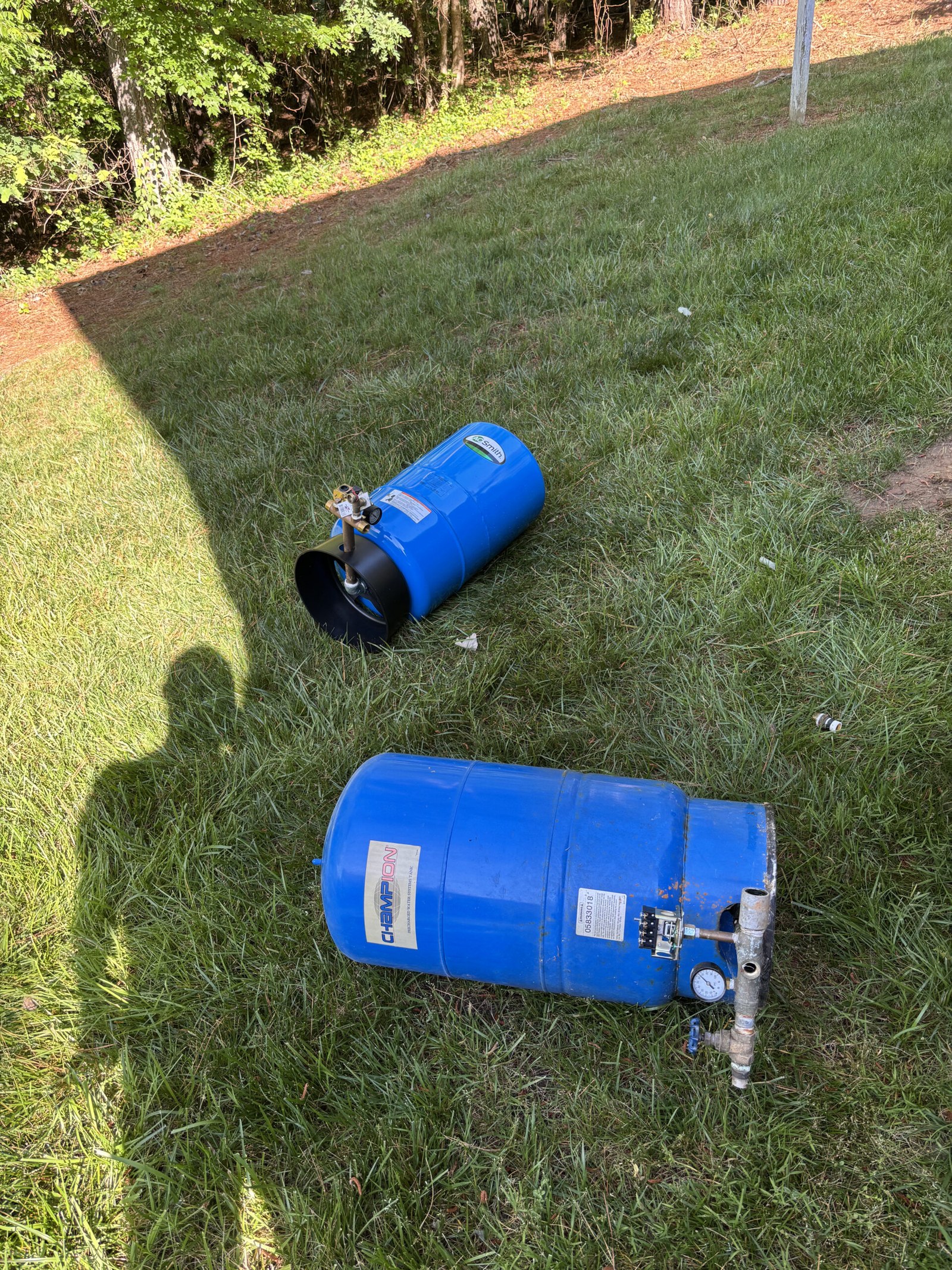 New blue pressure tanks ready for installation