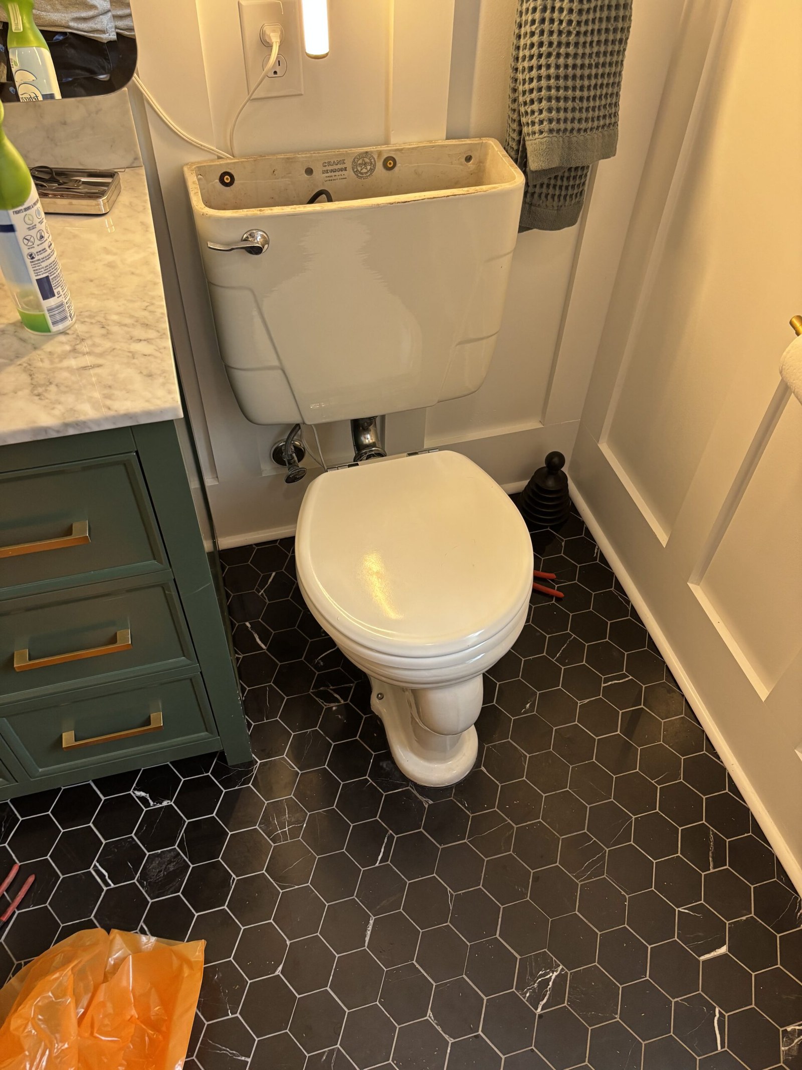 Refreshed bathroom with new toilet and vanity