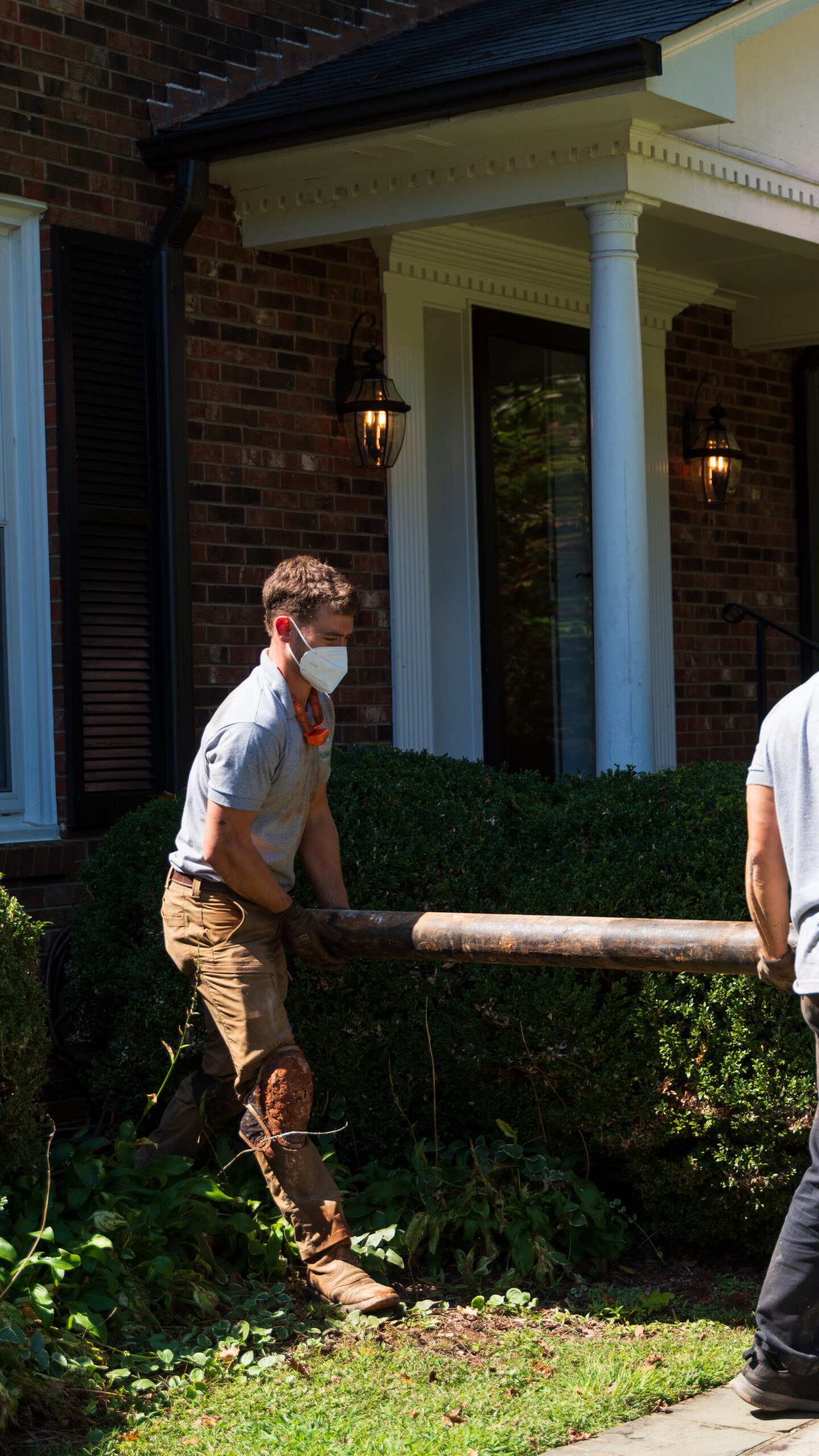 Outdoor repair work at the side of a customer's home