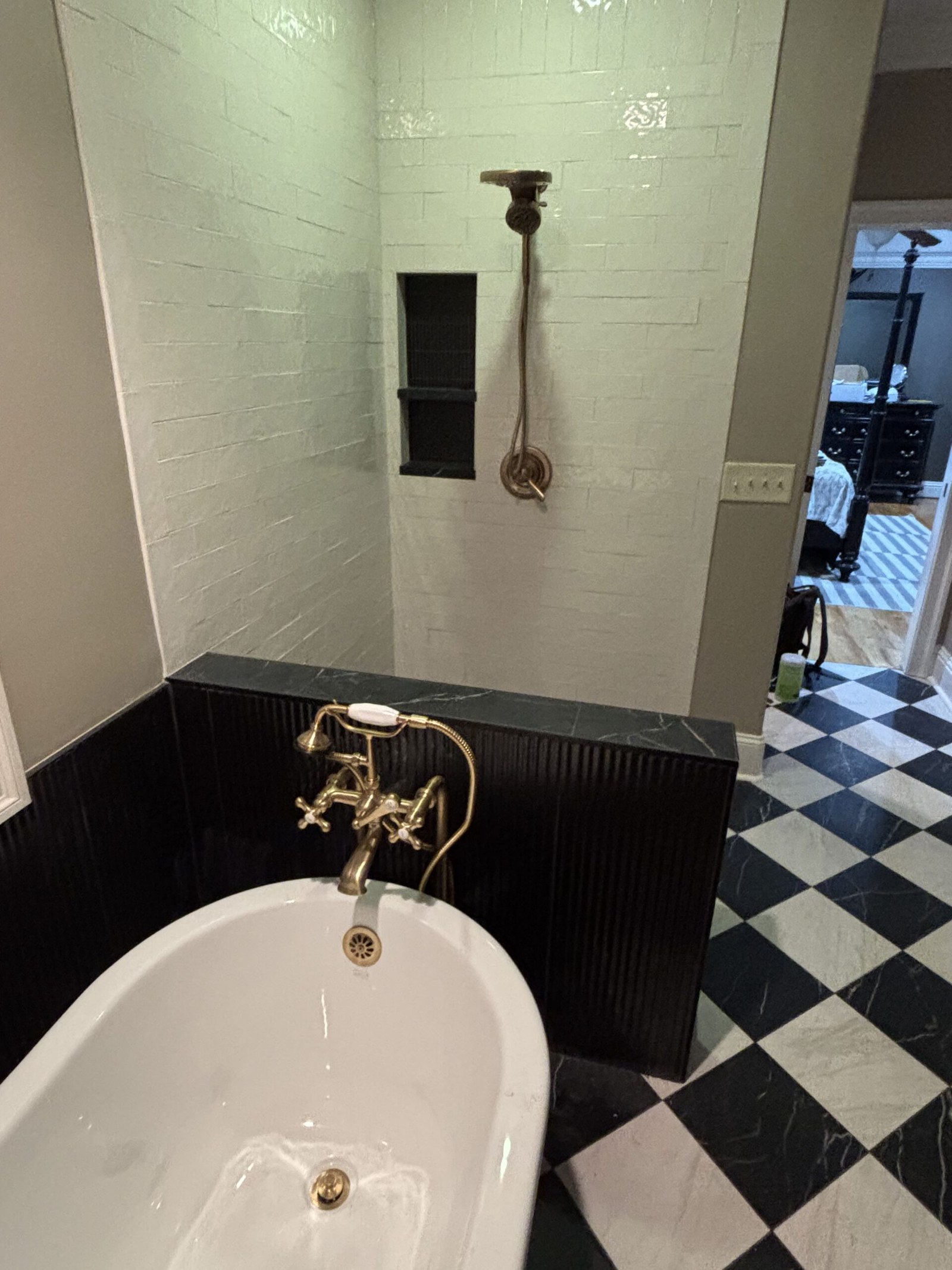 Remodeled bathroom with new tub and shower fixtures